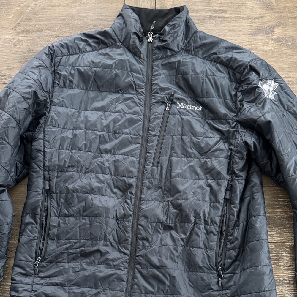 Pittsburgh penguins xl Marmot black Quilted Jacket